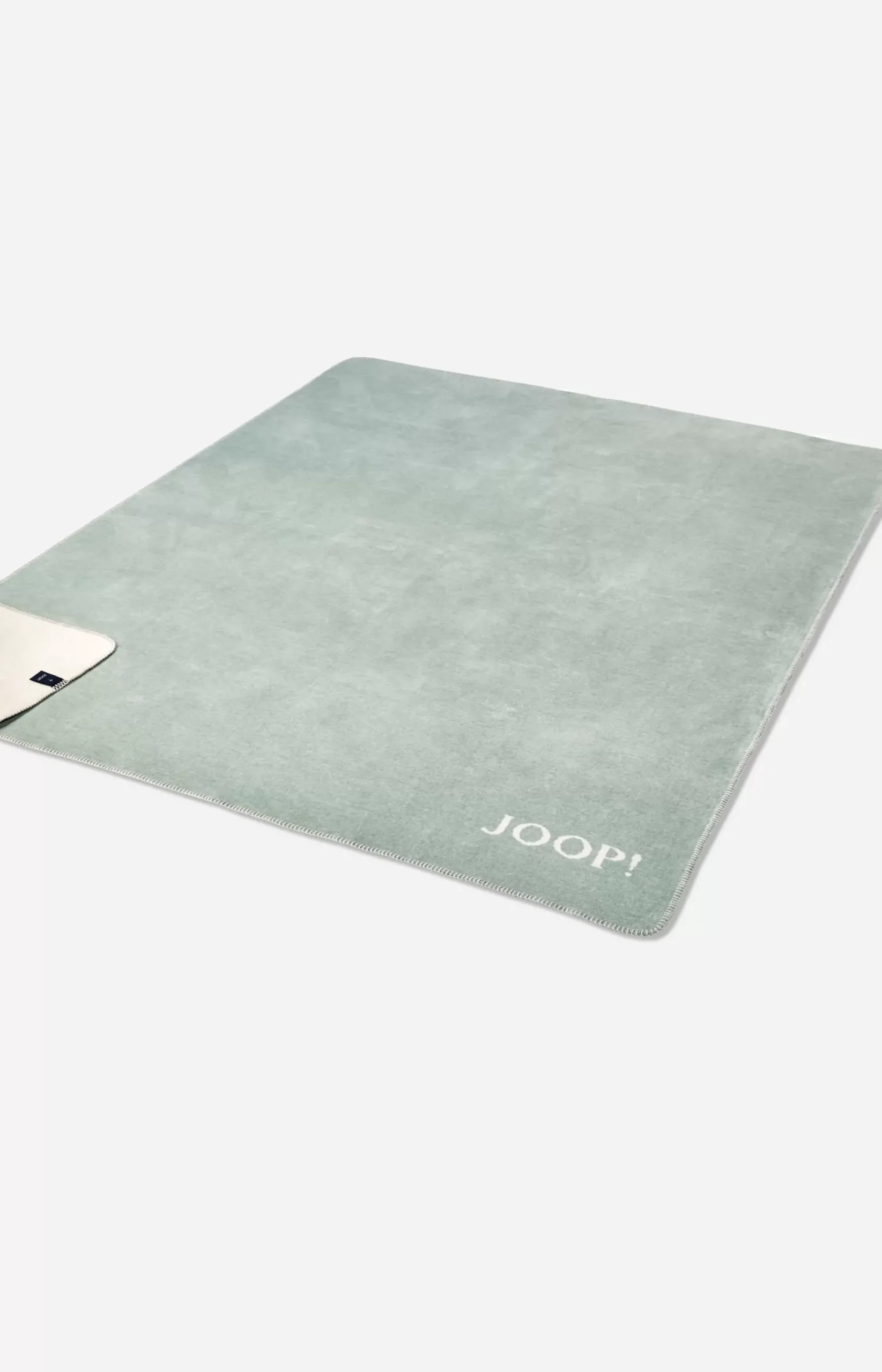 JOOP! MELANGE-DOUBLEFACE throw in jade/nature